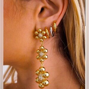 For love and Lemons x Luv Aj Gold Daisy statement Earrings Sold out!